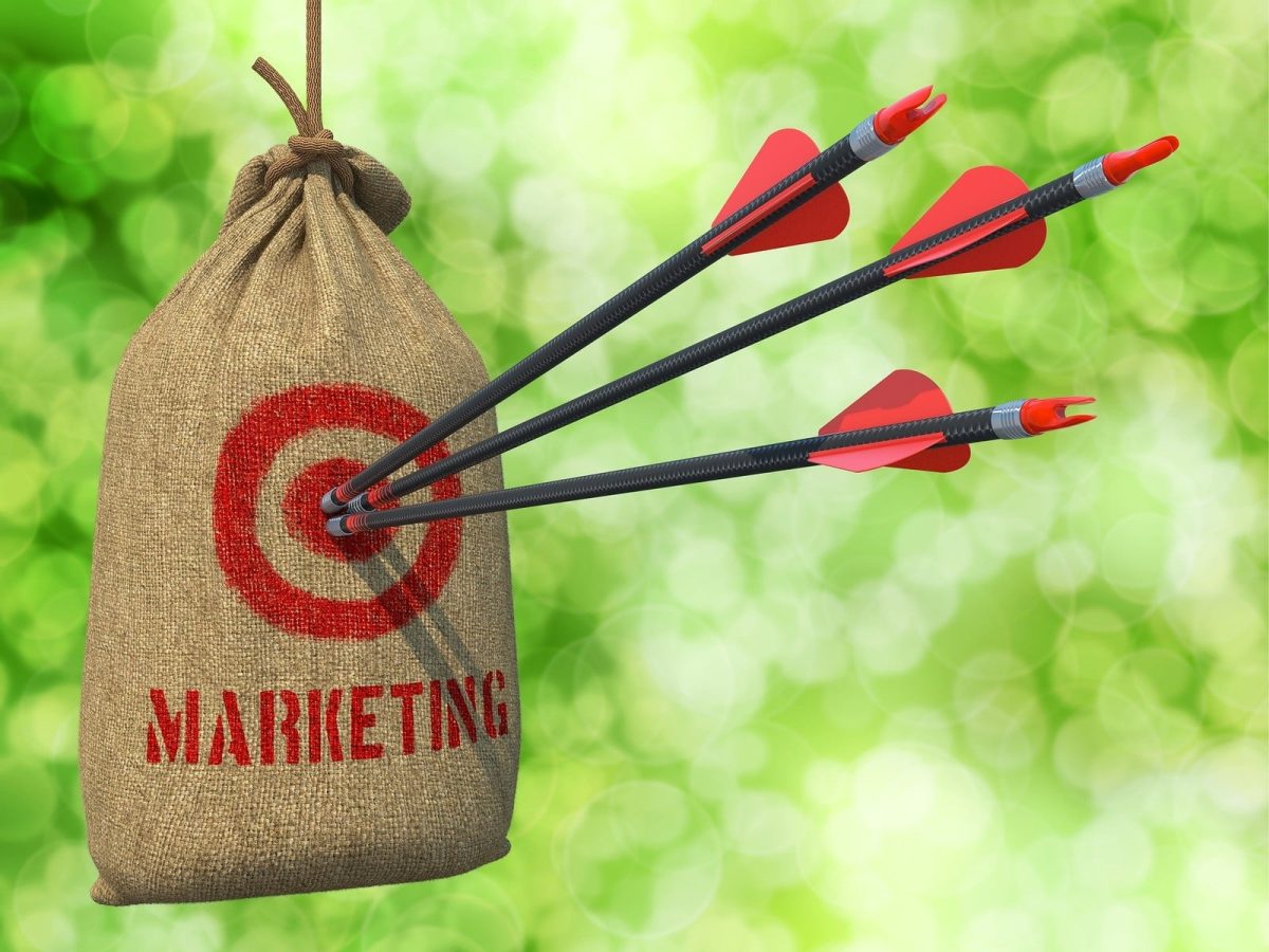 Marketing - Arrows Hit in Red Mark Target.